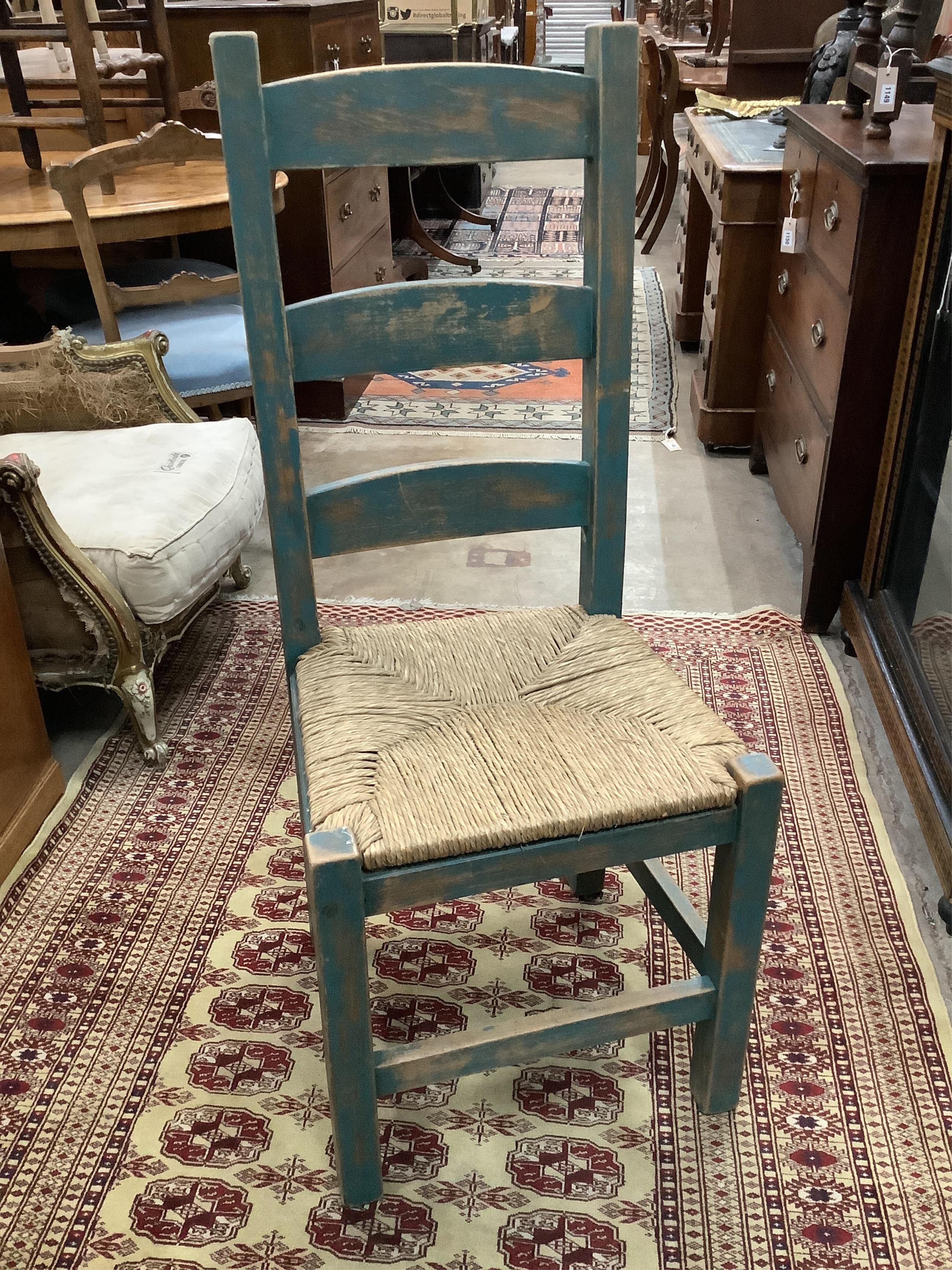 A set of six painted rush seat ladder back dining chairs, width 41cm, depth 40cm, height 107cm